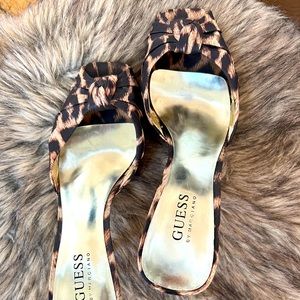 Guess brand peep toe mules. In mint condition.